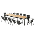 A 13-piece dining set with a natural wood tabletop and black frame, including a long table and twelve black chairs with grey cushions, on a white background.