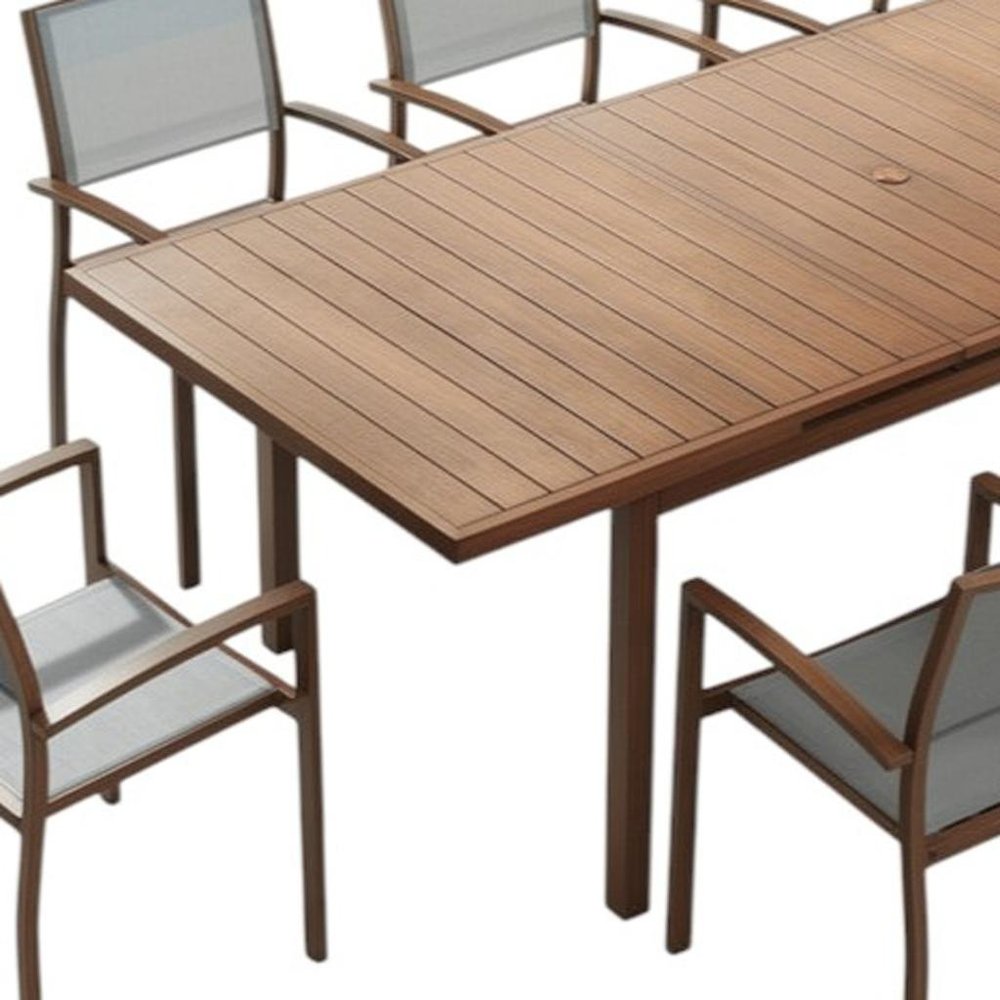 Nine Piece Brown Metal Dining Set with Eight Chairs