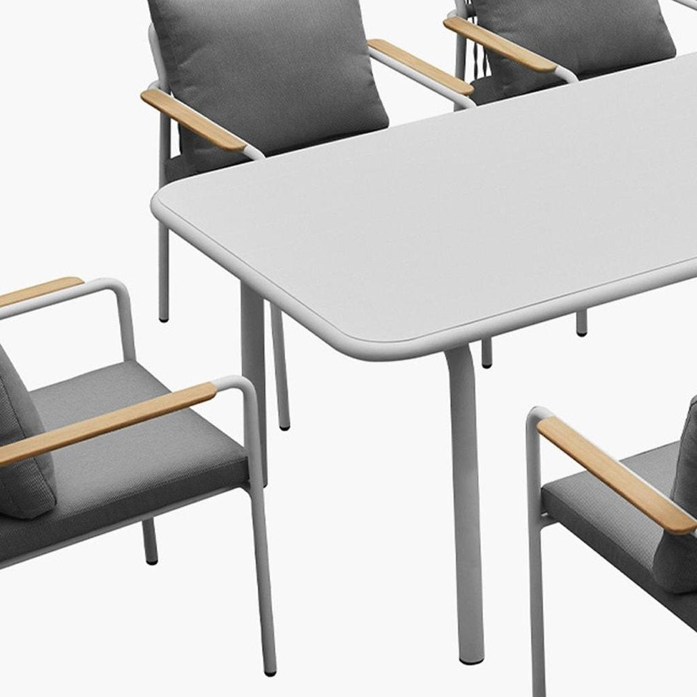 Nine Piece White Metal Dining Set with Eight Chairs on a white background
