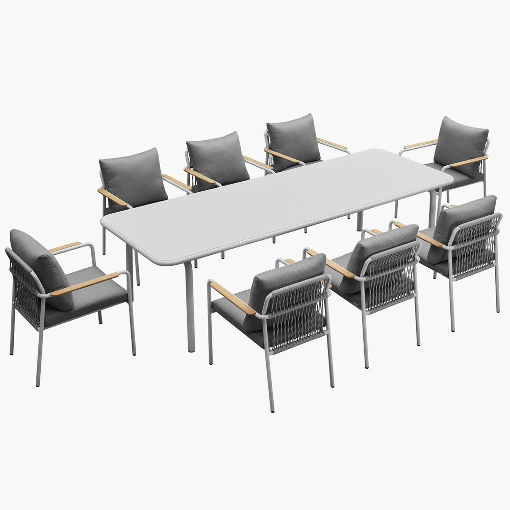 Nine Piece White Metal Dining Set with Eight Chairs on a white background
