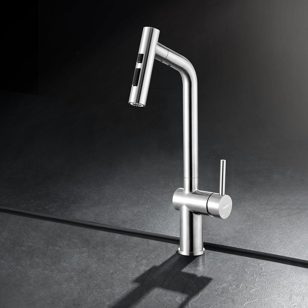 Silver stainless steel bar faucet with a pull-down sprayer on a dark countertop with a shadow.