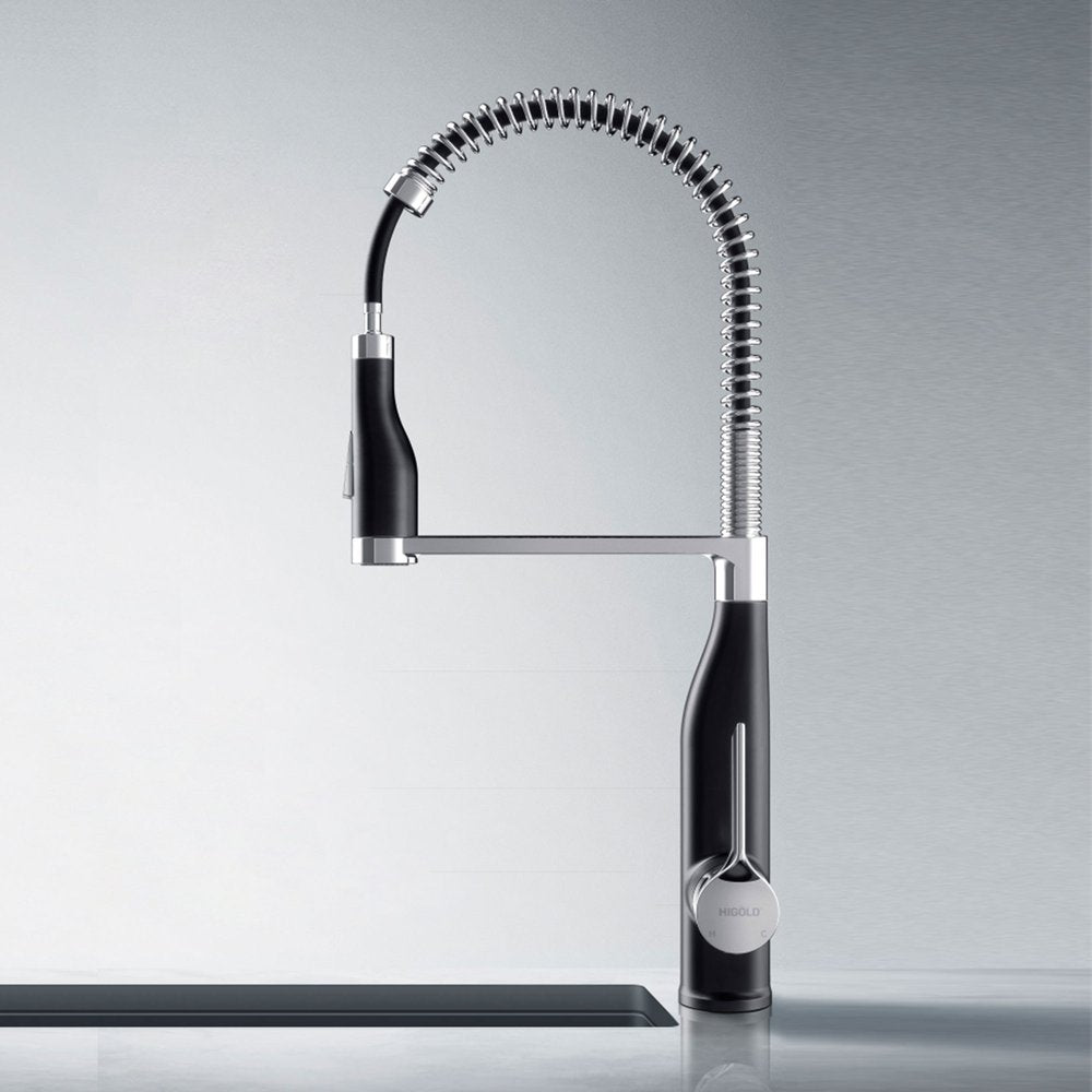 Black stainless steel pull-down kitchen faucet with a coiled hose and silver accents against a brushed metal background.