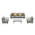 Four Piece Black Metal Outdoor Patio Set With Table