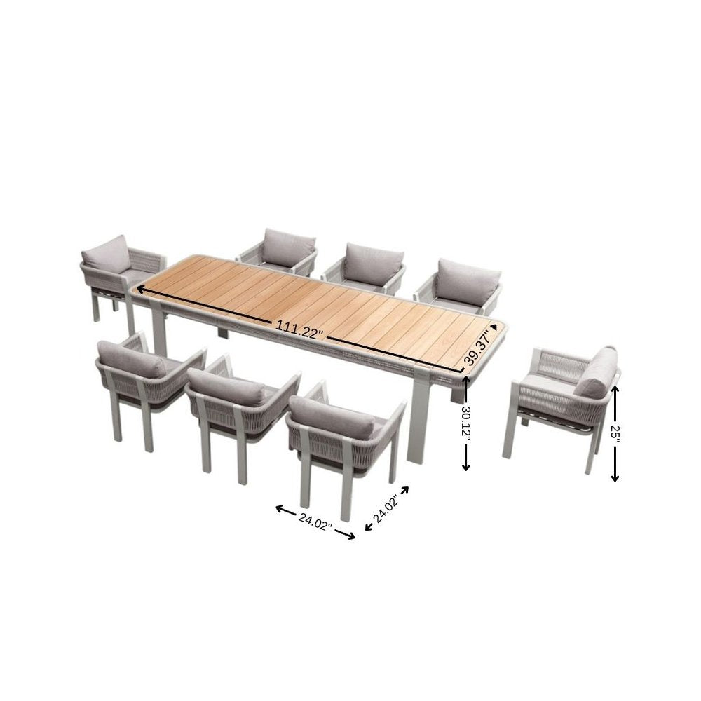 Nine Piece Light Brown and Beige Solid Wood Dining Set with Eight Chairs on a white background