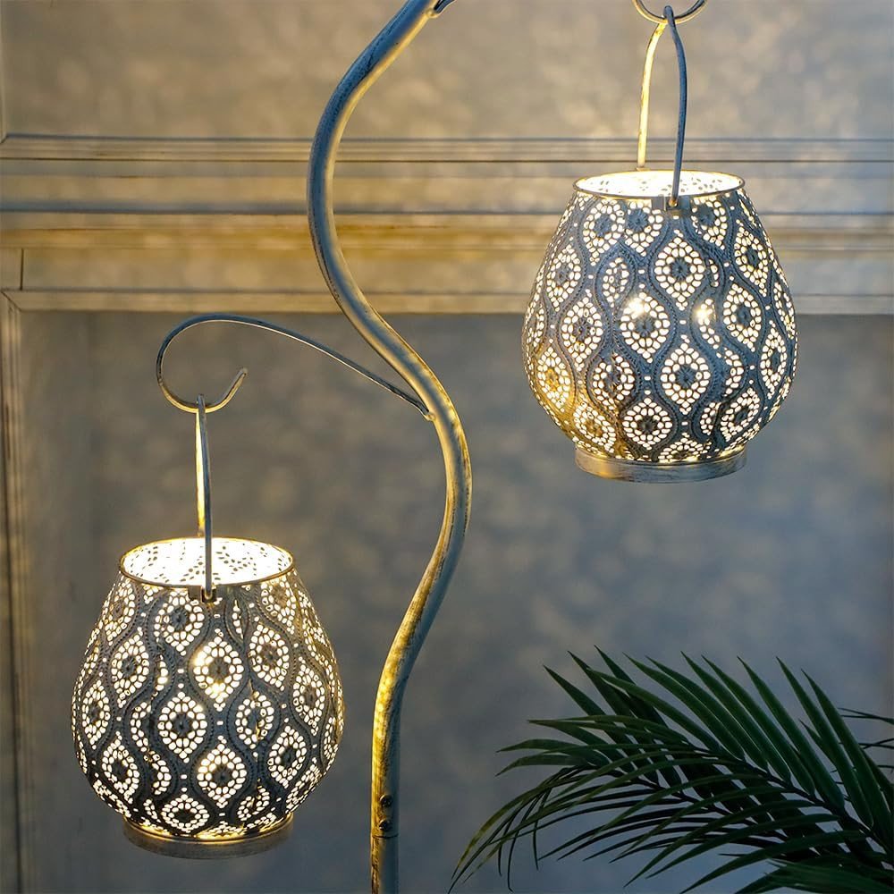 Set of Two 10" Beige Pierced Geometric Cordless Lantern Lamps in a home interior