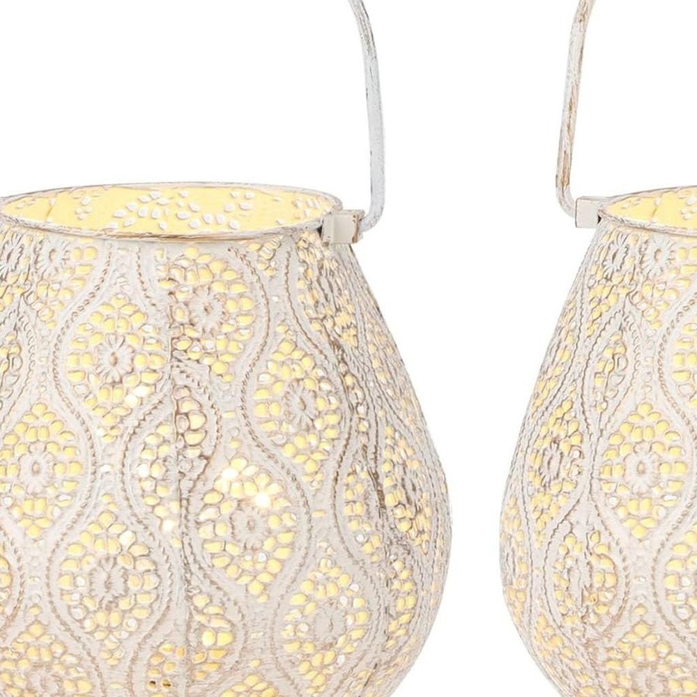 Set of Two 10" Beige Pierced Geometric Cordless Lantern Lamps on a white background