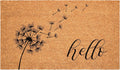 Brown and black floral "hello" outdoor coir doormat with dandelion seeds blowing in the wind.