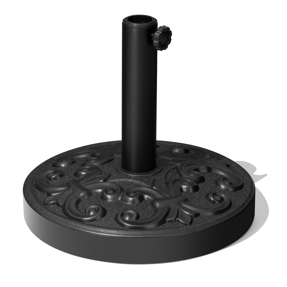Black round umbrella base with ornate scrollwork and a central pole with a tightening knob, on a white background.