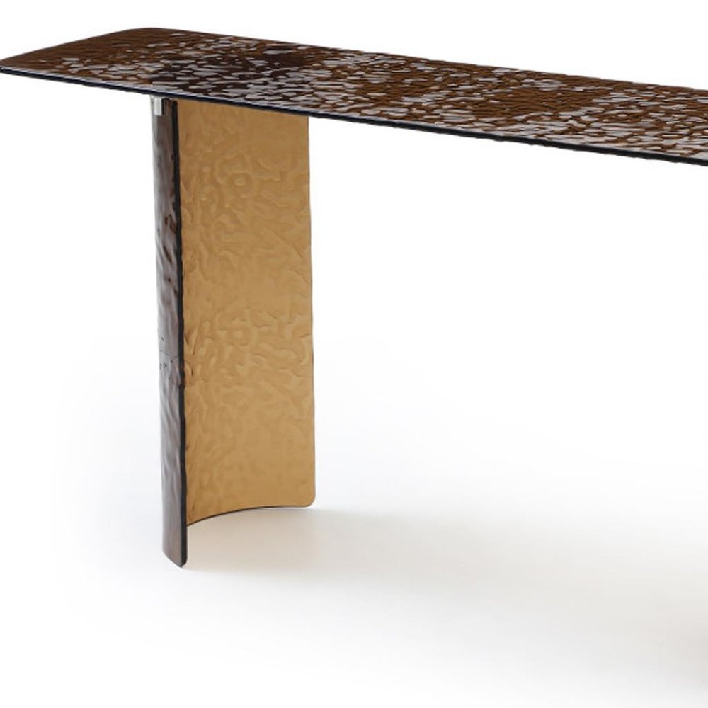 63" Bronze Glass Double Pedestal Console Table. Console table isolated on a plain white background, showing a glass surface.