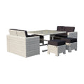 Seven Piece White and Dark Gray Wicker Upholstered Cushions Outdoor Patio Set With Table on a white background