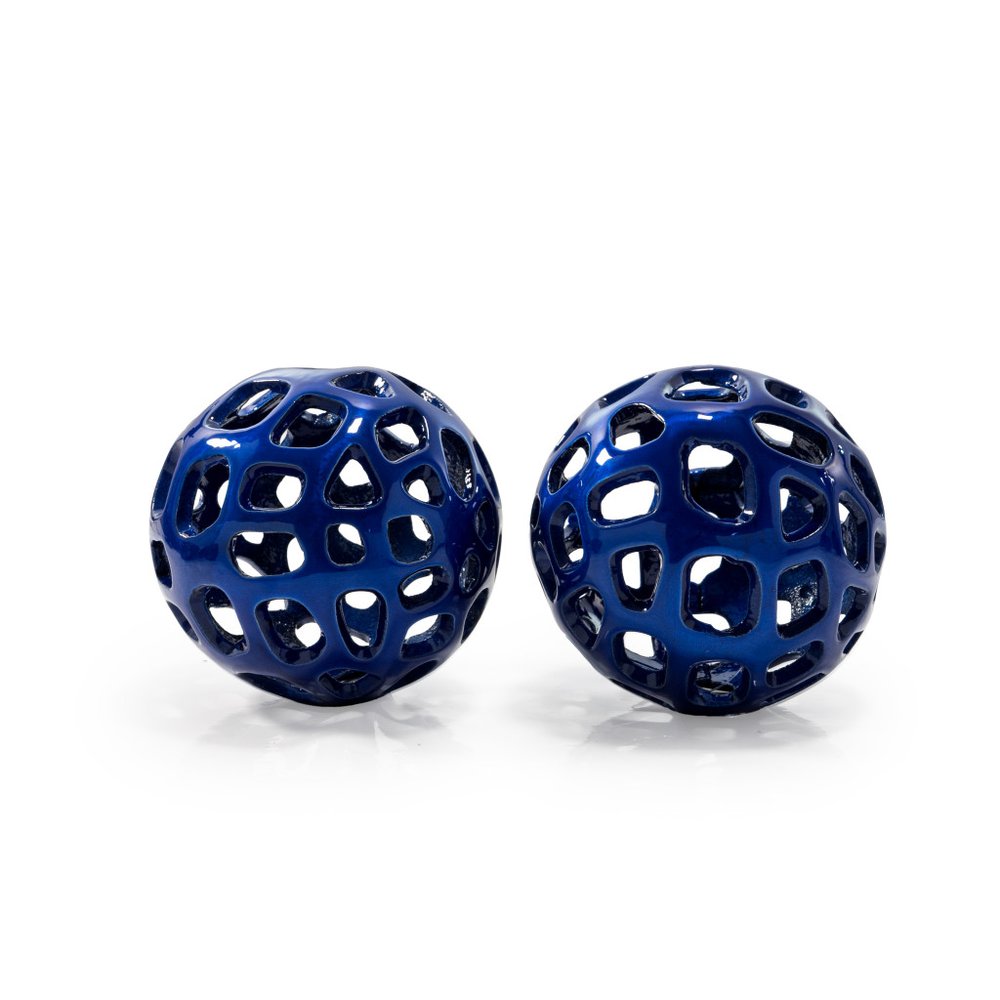 Two blue, hollow, decorative orbs with a metallic finish on a white background.