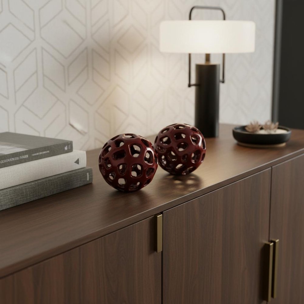 Set of Two Red Aluminum Hand Painted Decorative Orbs in a home interior