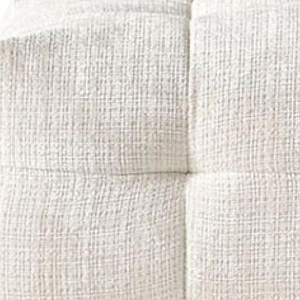 Close-up of 36" Beige and Black Chenille Tufted Pouf Ottoman showing the beige texture.
