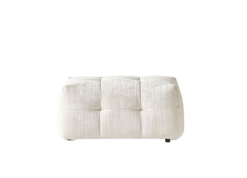 A beige chenille tufted pouf ottoman with black legs on a white background.