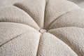 32" Taupe Tufted Boucle Tufted Round Ottoman. Ottoman isolated on a plain white background, in a taupe finish.