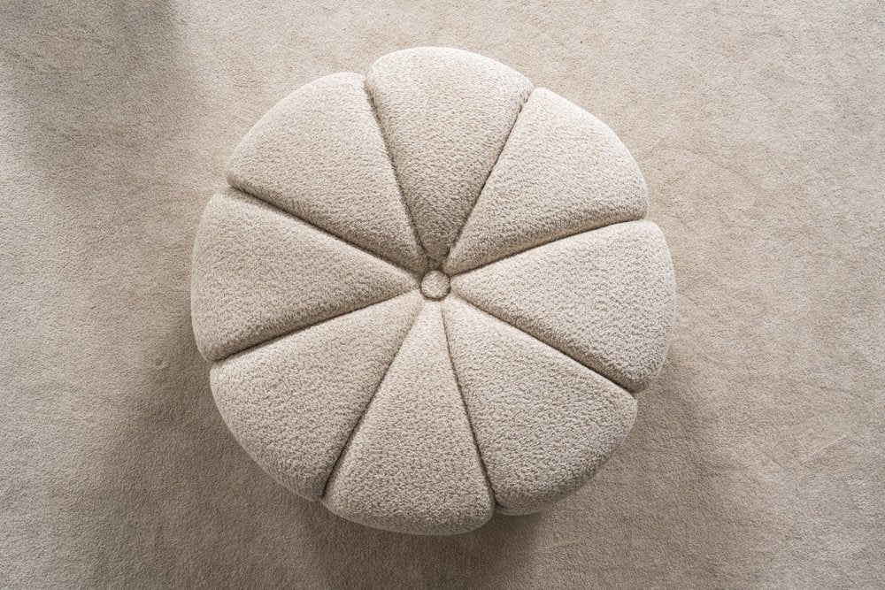Detail view of 32" Taupe Tufted Boucle Tufted Round Ottoman, filling the frame with the surface texture.