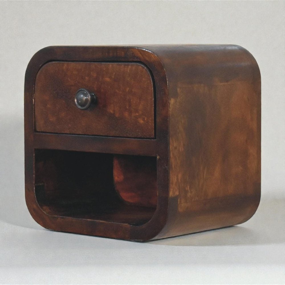 A small, rounded, dark brown wooden nightstand with one drawer and an open shelf, set against a plain background.