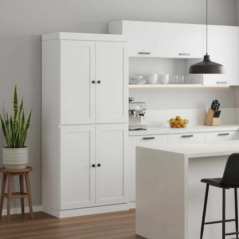 72" White Solid Wood Four Door Pantry Or Storage Closet in a home interior