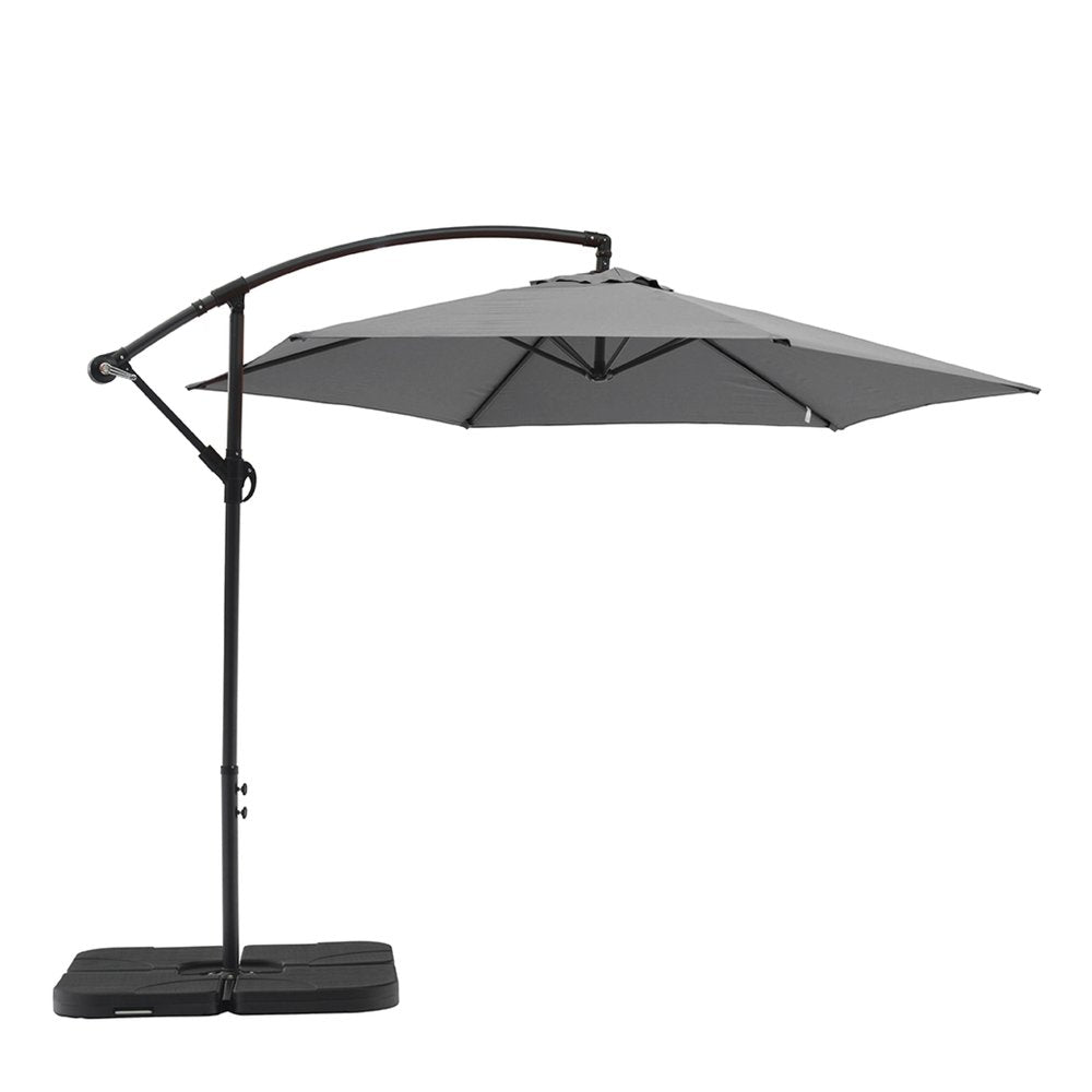 Gray hexagonal cantilever patio umbrella with a black base and pole, shown against a white background.