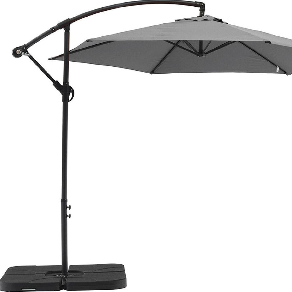 9.5' Gray Polyester Hexagonal Cantilever Patio Umbrella with Stand on a white background