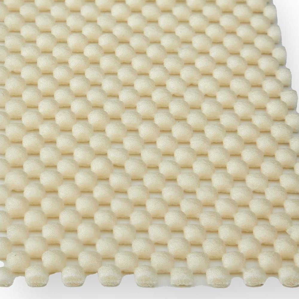 Close-up of 6' x 9' White Non Slip Rug Pad showing the white texture.