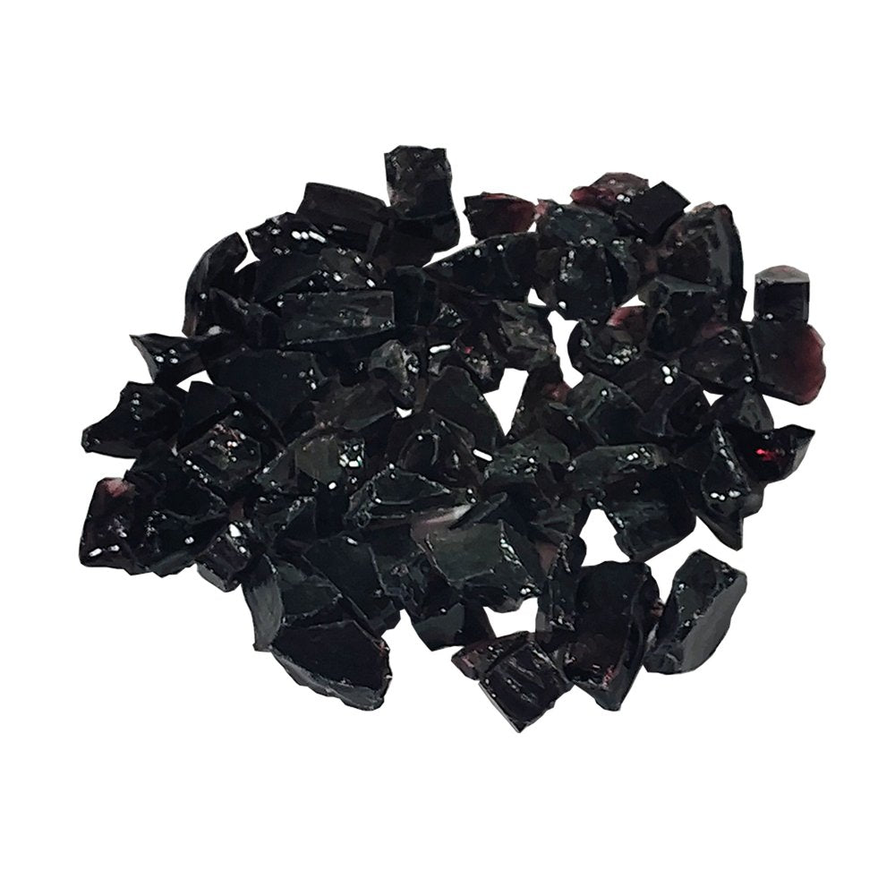 Pile of dark purple, reflective, crushed glass pieces on a white background.