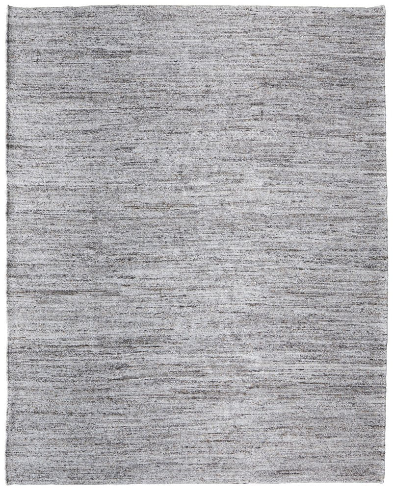 Gray and brown handmade indoor outdoor area rug with a textured, striped pattern.