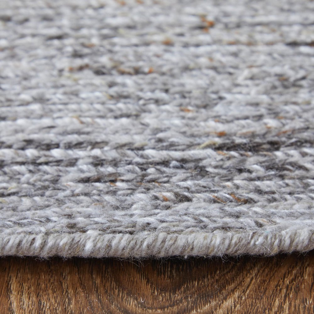 9' X 13' Gray And Brown Handmade Indoor Outdoor Area Rug in a home interior