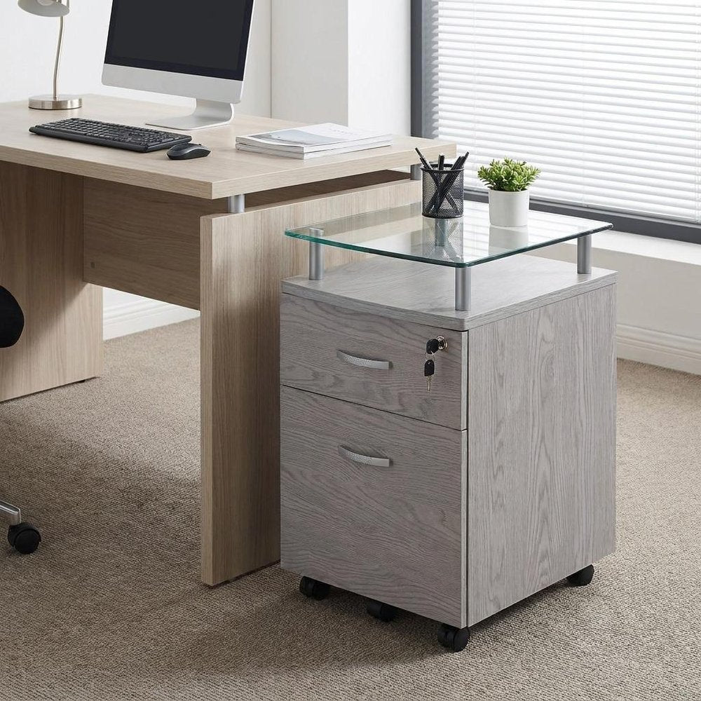 Close-up of Gray Glass And Metal Two Drawer Rolling Filing Cabinet showing gray glass detail.