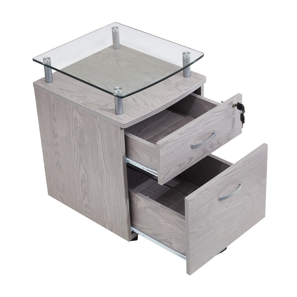 Gray Glass And Metal Two Drawer Rolling Filing Cabinet. Filing cabinet isolated on a plain white background, finished in gray glass.