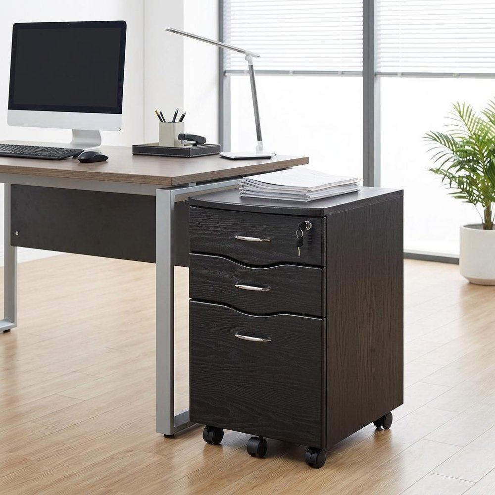 25" Espresso Wood Three Drawer Rolling Filing Cabinet. Filing cabinet in charcoal wood.