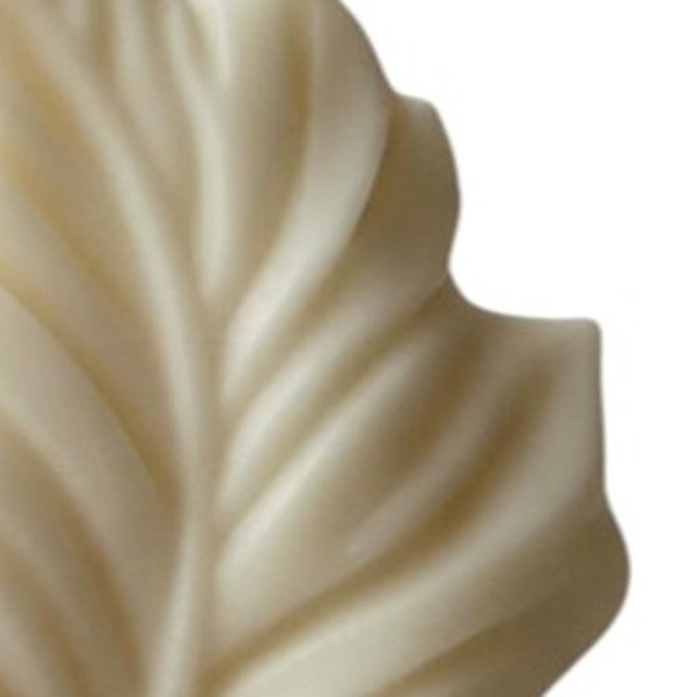 6" Ivory Rose Petals Scented Dimensional Feather Candle Novelty Novelty. Candle in ivory.