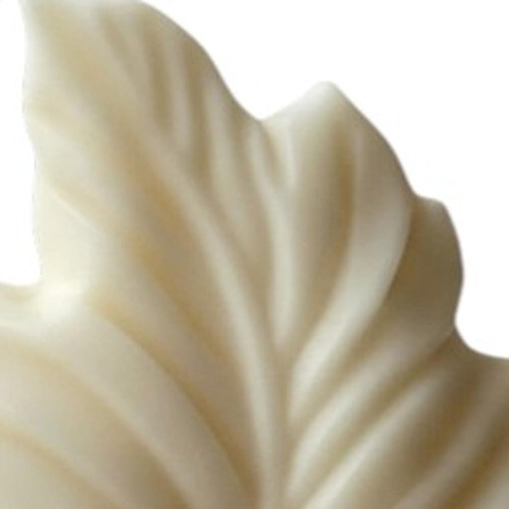 6" Ivory Rose Petals Scented Dimensional Feather Candle Novelty Novelty. Candle in ivory.