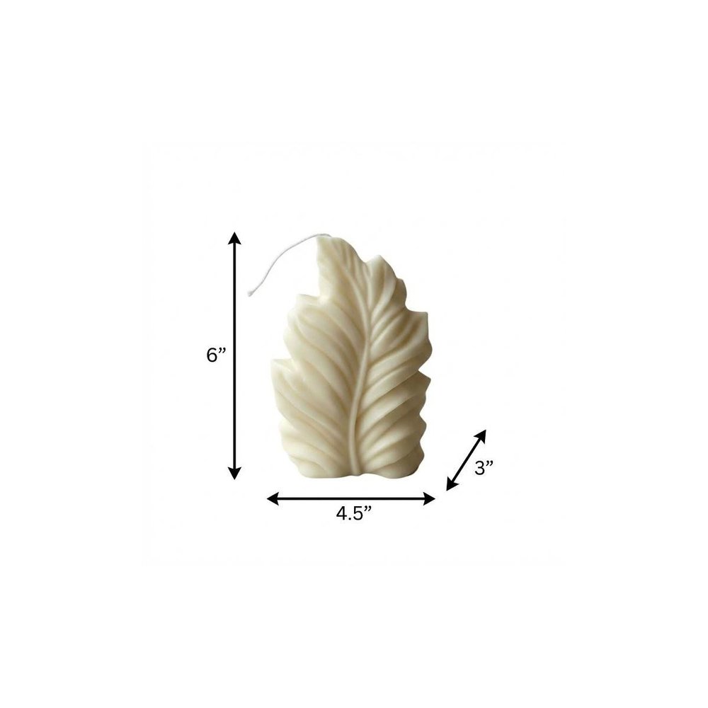 6" Ivory Rose Petals Scented Dimensional Feather Candle Novelty Novelty. Candle isolated on a plain white background, in a ivory finish.