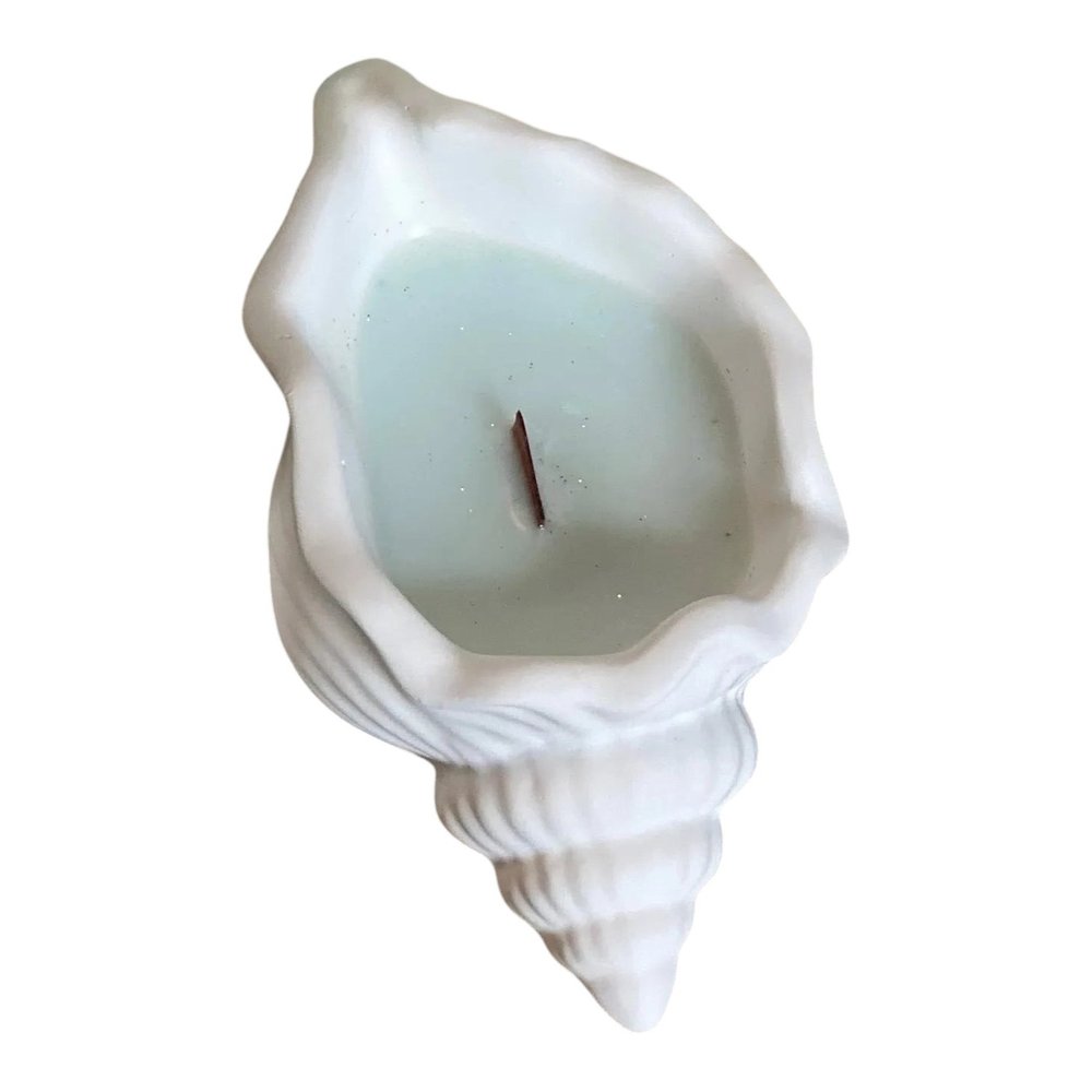 6" Light Blue High Tide Scented Soy Wax Candle In White Resin Novelty Holder. Candle isolated on a plain white background, in a white resin finish.
