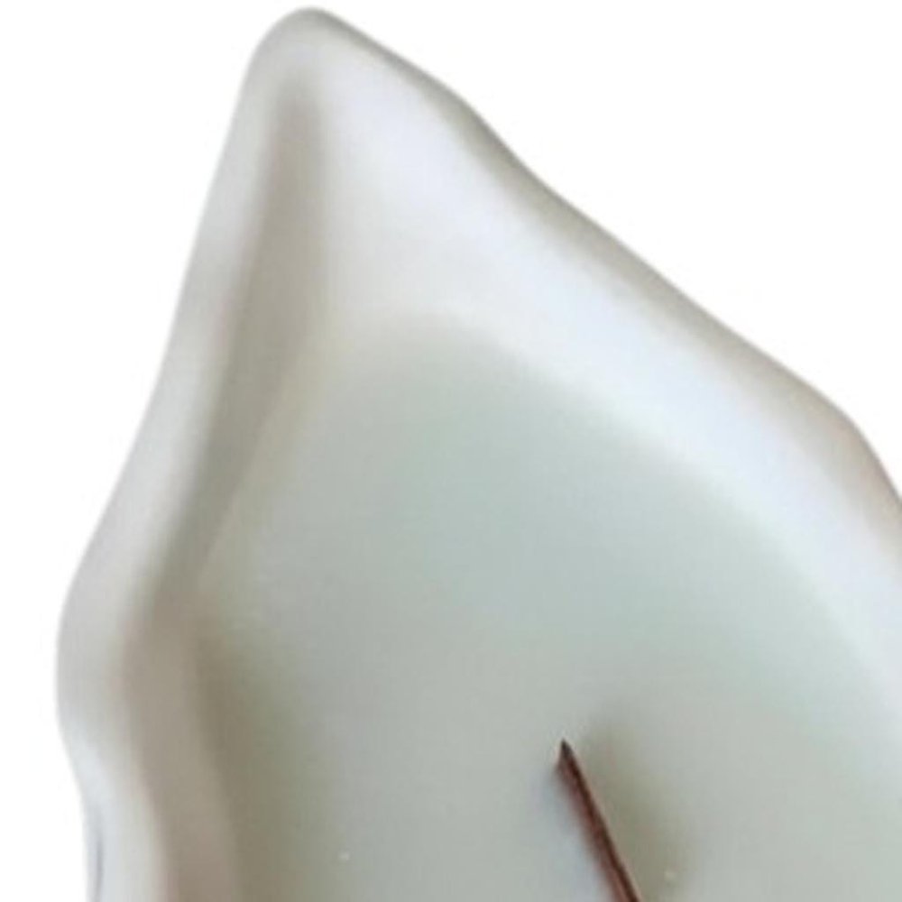 6" Light Blue Ocean Breeze Scented Soy Wax Candle In White Resin Novelty Holder. Candle isolated on a plain white background, finished in white resin.