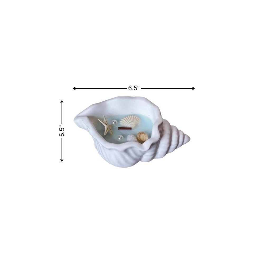 6" Light Blue Unscented Soy Wax Candle In White Resin Novelty Holder With Seashells. Candle isolated on a plain white background, in a white resin finish.