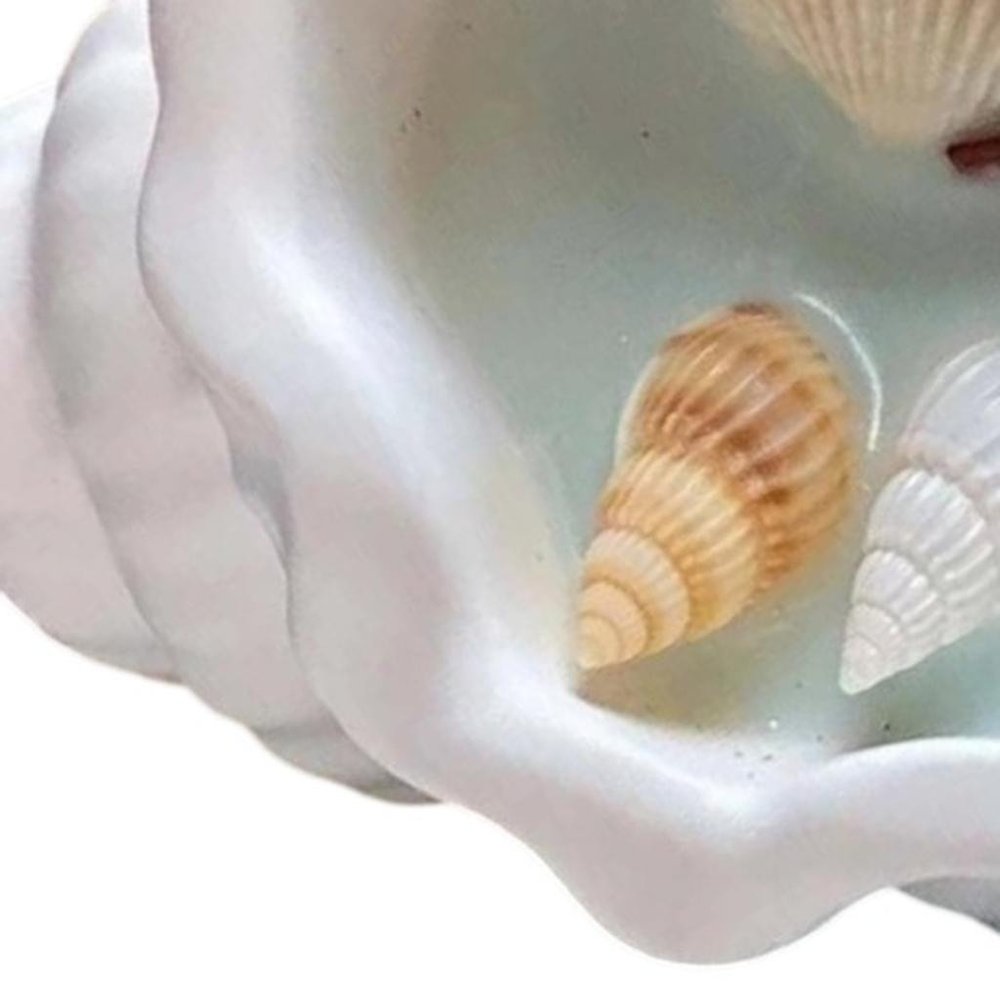 6" Light Blue Sea Salt And Orchid Scented Candle In White Resin Novelty Holder With Shells.