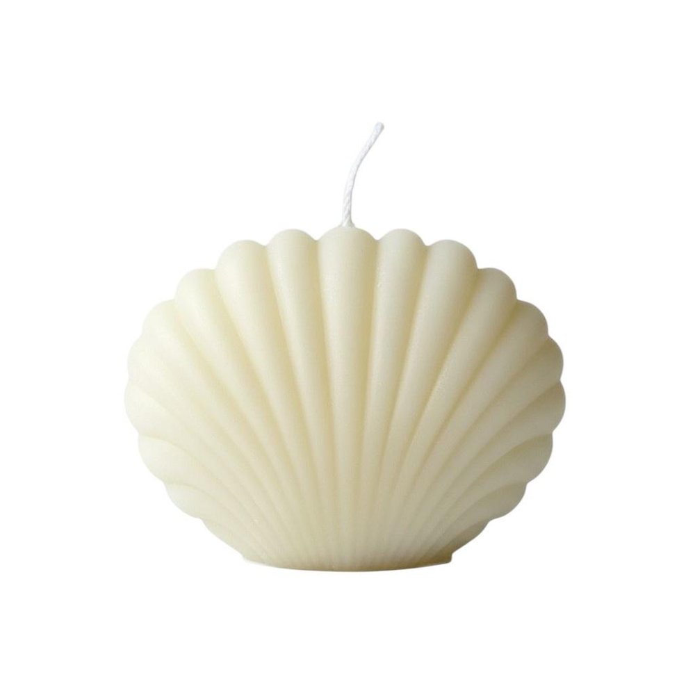 4" Ivory Black Ice Scented Dimensional Seashell Candle. Candle isolated on a plain white background, in a ivory finish.