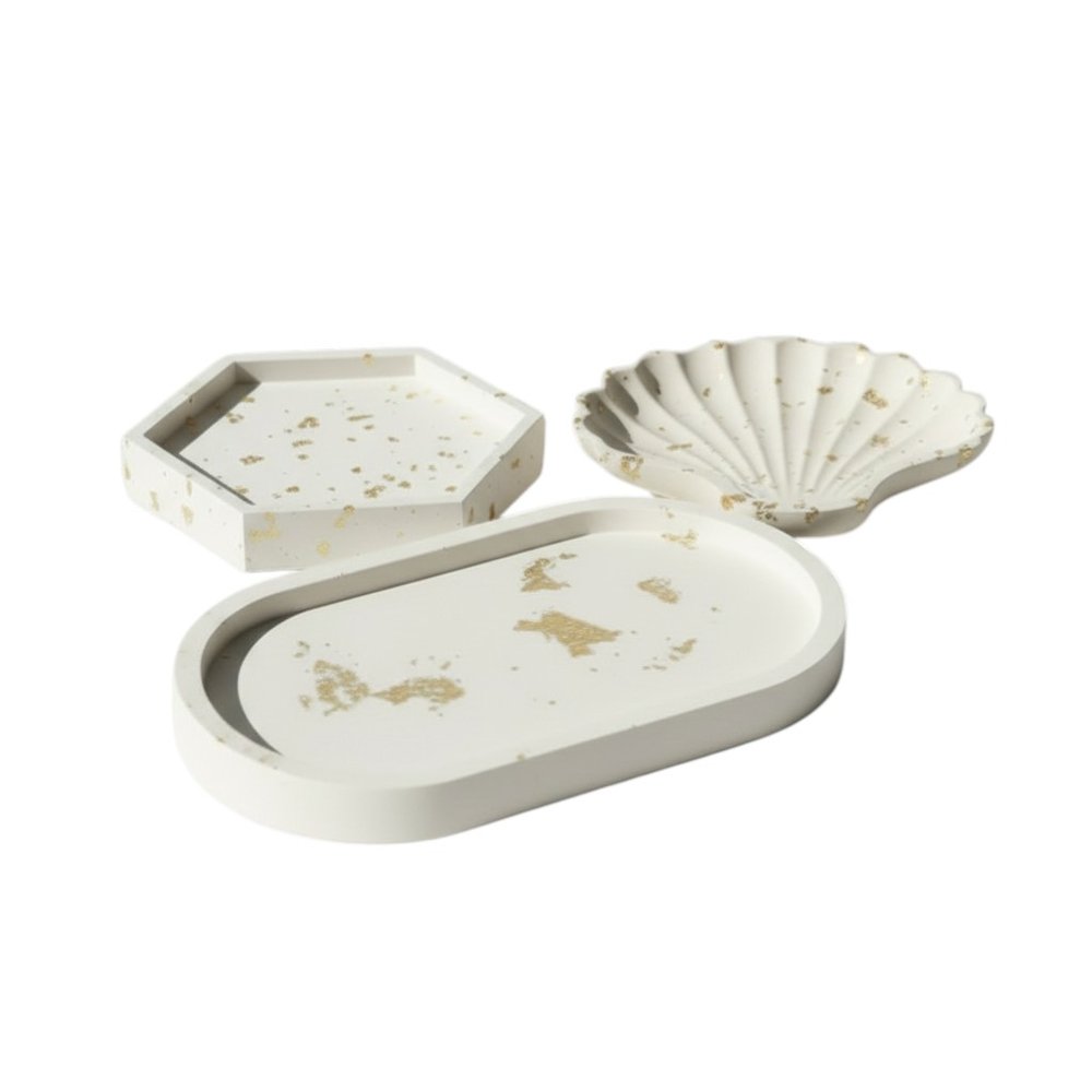 Set of Three Gold And White Resin Handmade Trinket Trays on a white background