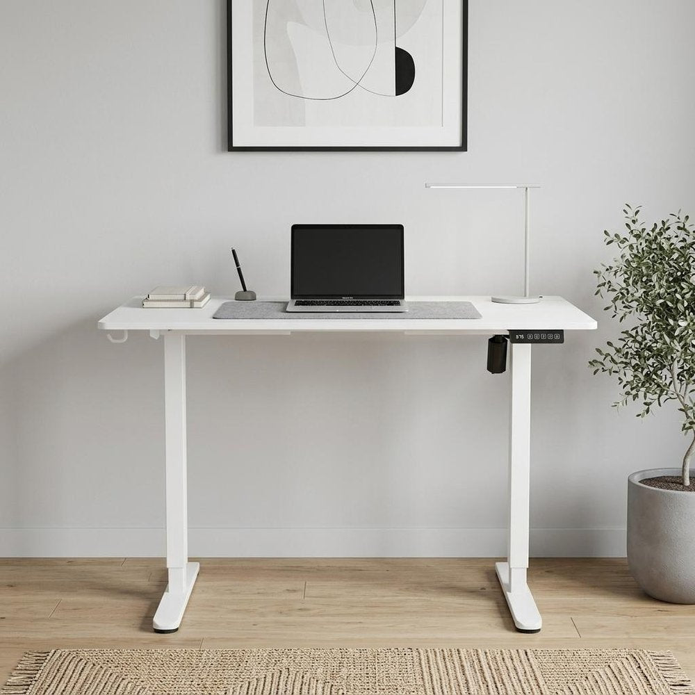 Adjustable Black Wood and Steel Standing Desk on a white background
