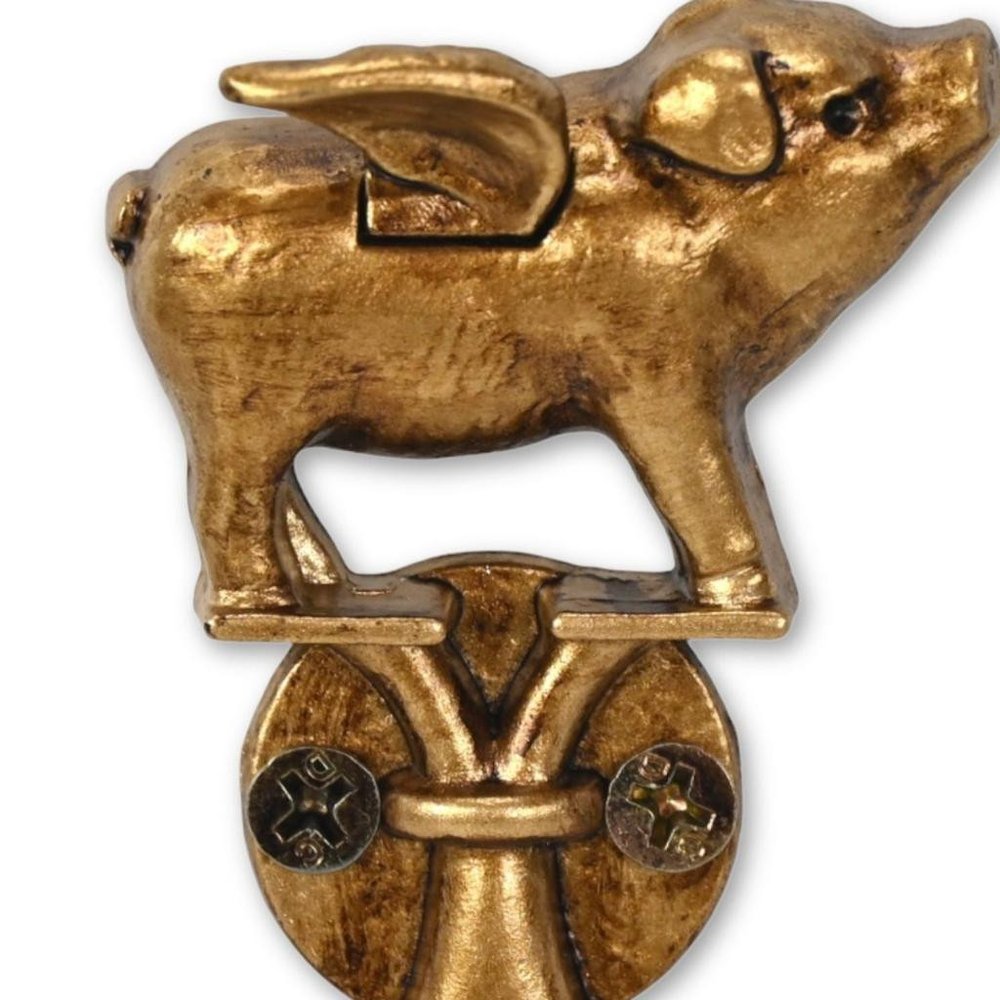 Two Hook 2" Antiqued Gold Cast Iron Pig Wall Hooks on a white background