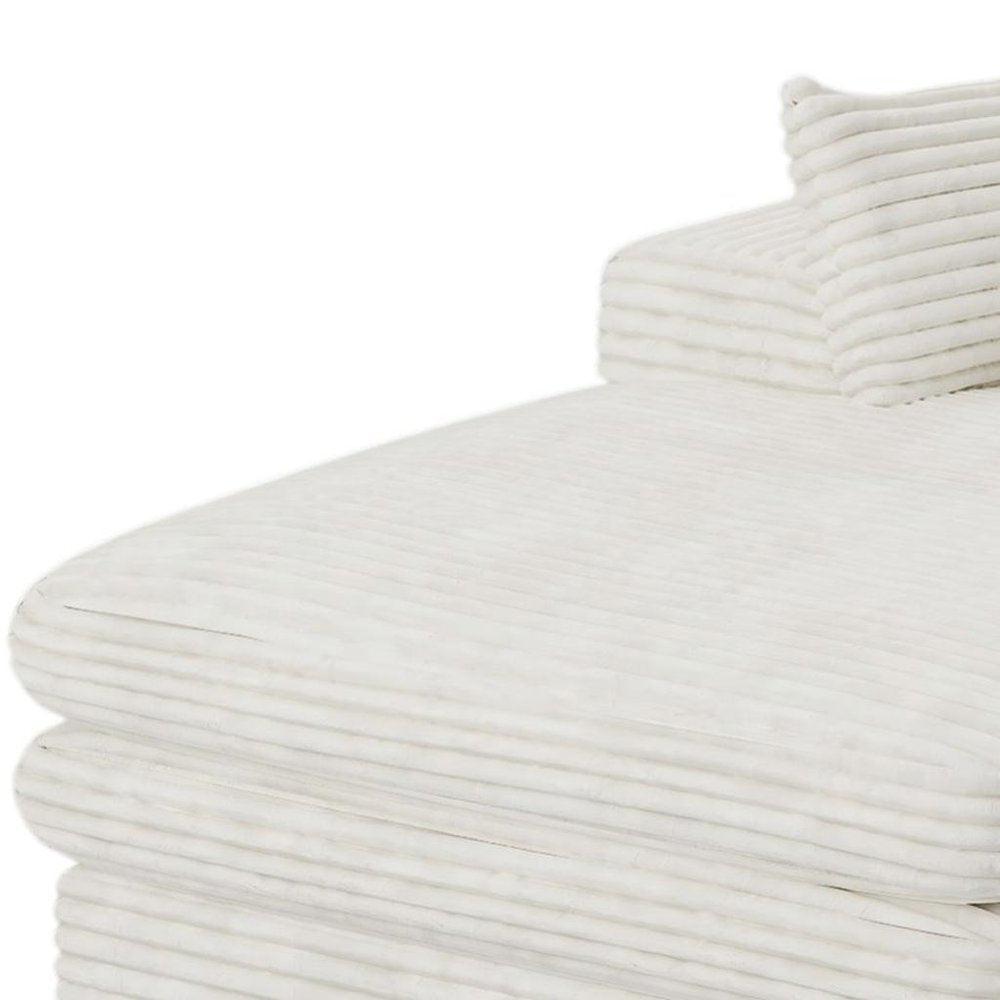 67" White Corduroy Left Hand Facing Chaise Lounge Chair. Accent chair isolated on a plain white background, showing its white color.