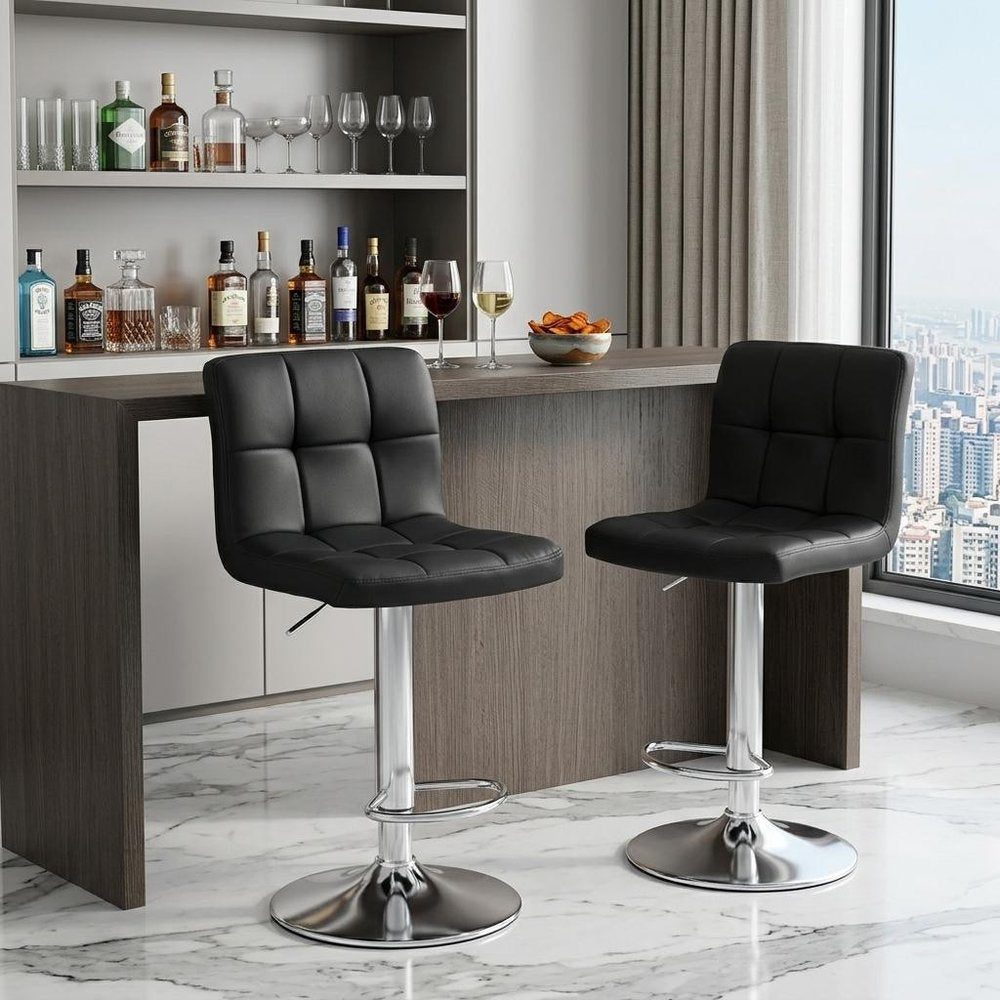Set of Two Black and Silver Faux Leather and Aluminum Adjustable Height Swivel Bar Chairs