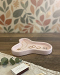 8" Pale Pink Resin Handmade Geometric Trinket Tray in a home interior