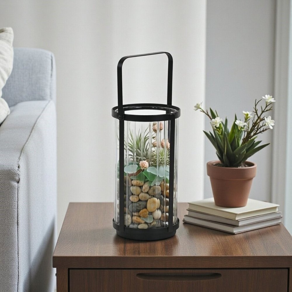 9" Clear And Black Glass And Metal Tabletop Lantern Candle Holder in a home interior