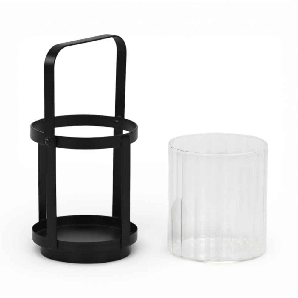 5" Clear And Black Glass And Metal Tabletop Lantern Candle Holder. Candle holder isolated on a plain white background, in a black glass finish.