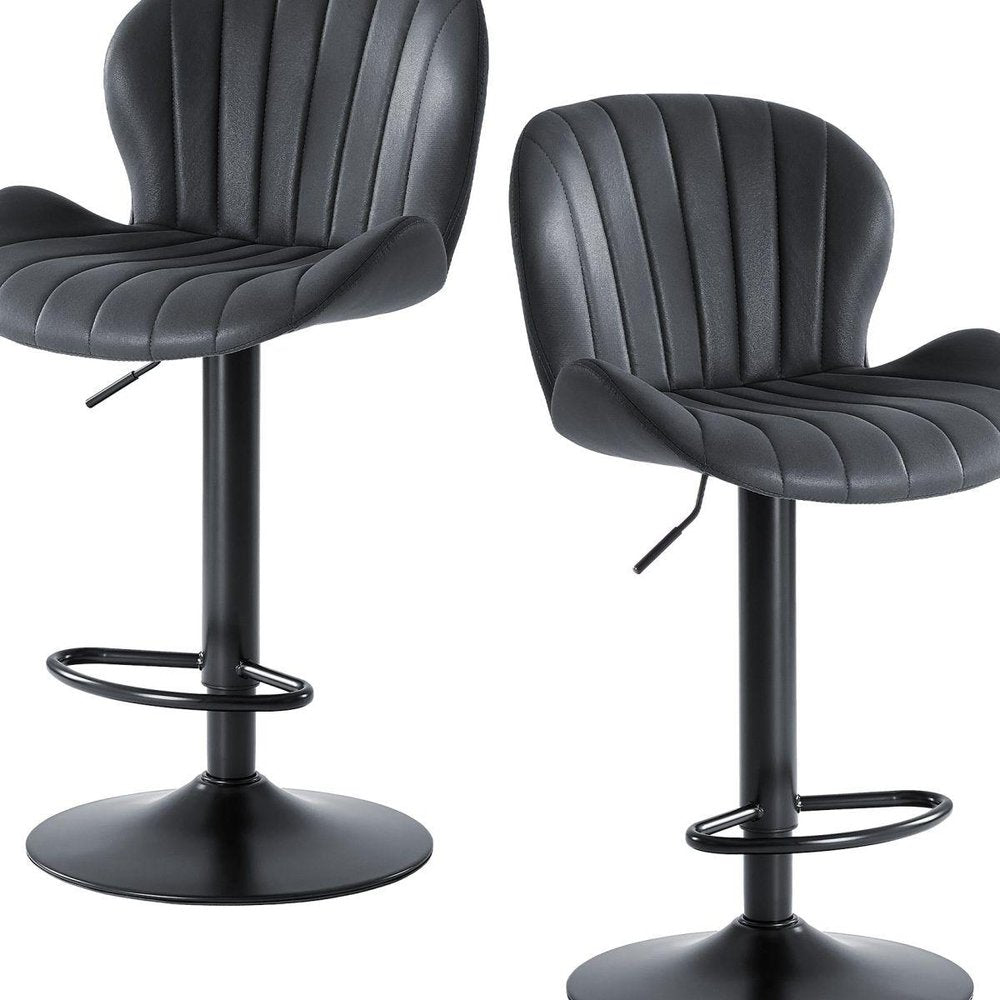 Set of Two Black Faux Leather And Aluminum Adjustable Height Swivel Bar Chairs on a white background