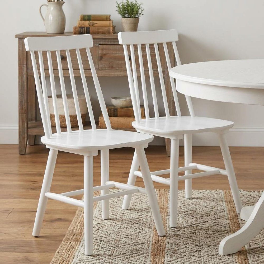 Set of Two White Solid Wood Windsor Back Dining Side Chairs in a home interior