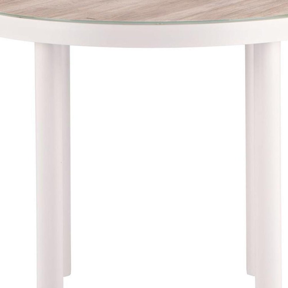 36" Natural and White Glass Wood and Aluminum Round Outdoor Dining Table. Outdoor table isolated on a plain white background, in a white glass finish.
